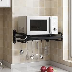 a microwave oven sitting on top of a shelf above a counter with utensils