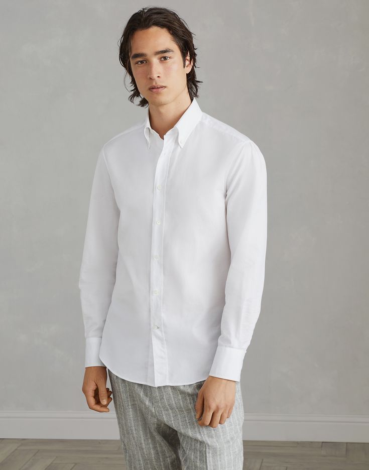 Twill slim fit shirt with button-down collar This lightweight cotton twill shirt is an essential and versatile element for any look. A button-down collar adds a touch of traditional elegance and the modern slim fit, which remains close to the body, highlights the male physique. Timeless Slim Fit Button-up Shirt, Timeless Button-up Shirt For Business Casual, Timeless Semi-formal Button-up Shirt, Timeless Slim Fit Shirt With Button Closure, Classic Unstructured Shirt For Workwear, Classic Button-up Shirt, Classic Slim Fit Solid Shirt, Classic Slim Fit Shirt For Spring, Classic Button-up Flannel Shirt