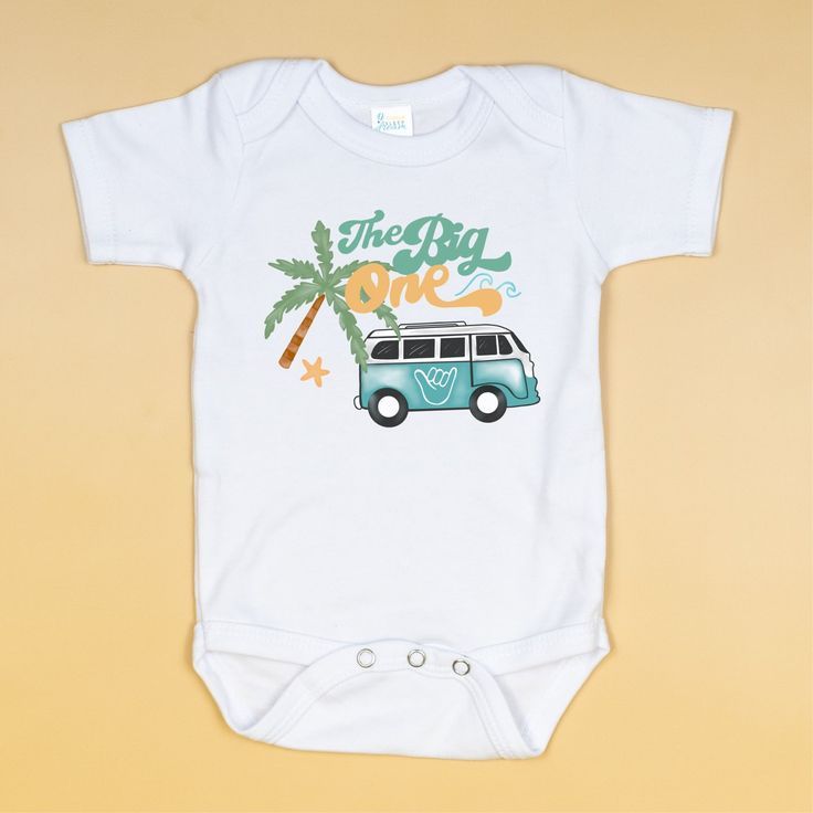 Make waves with the Big One 1st Birthday Bodysuit- for your baby boy's rad bash! White Cotton bodysuit Full color graphic design Family matching tees and shorts available Exclusive design from Ryver & Co Summer Short Sleeve Onesie With Custom Print, White Short Sleeve Bodysuit For Summer, Unisex Short Sleeve Bodysuit For Summer Playtime, Summer Playtime Short Sleeve Bodysuit, Summer Short Sleeve Onesie With Letter Print, Summer Graphic Print Onesie For Playwear, Unisex Graphic Print Bodysuit For Summer, Summer Cotton Short Sleeve Bodysuit With Graphic Print, Summer Birthday Onesie With Short Sleeves