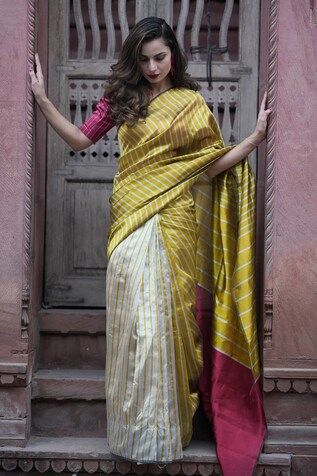 Silver mustard yellow saree featuring stripe pattern all over. Comes with an unstitched blouse fabric. - Aza Fashions Yellow Handloom Pre-draped Saree For Navratri, Elegant Yellow Handloom Blouse Piece, Yellow Handloom Silk Sets, Fitted Yellow Handloom Saree, Fitted Yellow Pre-draped Saree With Zari Weaving, Yellow Handloom Pre-draped Saree In Cotton Silk, Yellow Handloom Cotton Silk Pre-draped Saree, Yellow Cotton Silk Handloom Pre-draped Saree, Yellow Handloom Pre-draped Saree