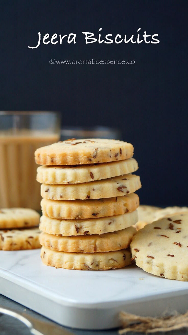 a stack of cookies sitting on top of a white plate