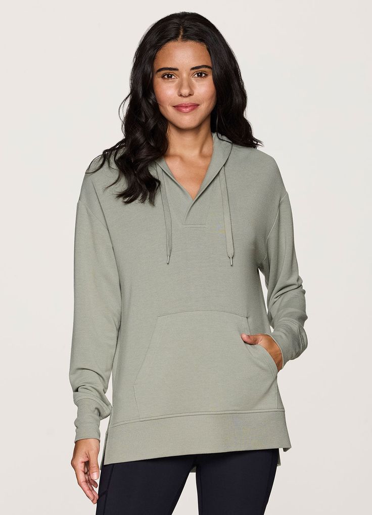 Featuring a functional front pocket and lightweight, breathable french terry fabric, our Long Weekend Hoodie Tunic was designed for versatile wear without sacrificing style. A slightly oversized, tunic length design offers optimal comfort, sleeve scrunching and layering options, while an attached hood with adjustable drawstrings protects you from the elements. Finished with a flattering v-neckline, this legging-friendly pullover can be worn year-round with your favorite active legging or fashion Tunic Hoodie, Fashion Bottoms, Oversized Tunic, Athleisure Fashion, Terry Fabric, French Terry Fabric, Active Leggings, Tunic Length, Long Weekend