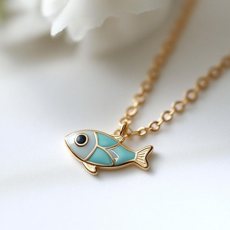 925 Silver Enamel Fish Pendant, Gold Animal Little Fish Pendant, Colorful Enamel Fish Pendant, Good Luck Fish Charm, Gold Enamel Fish Charm 🌺Item Details🌺 ♠️ Item Name : Fish Pendant ( Only Pendant ) ♠️ Metal : 925 Silver ♠️ Size : 20MM ♠️ Enamel : Same As Image                                         🌊 *About Us: Natural World Jewelry* 🐚 At Natural World Jewelry, we're passionate about bringing the serene beauty of the ocean to your everyday life. Our artisanal jewelry pieces are lovingly h Fish-shaped Enamel Jewelry Gift, Fish-shaped Enamel Jewelry As A Gift, Luxury Gold Fish-shaped Necklace, Fish Pendant Gold, Enamel Fish-shaped Jewelry As Gift, Fish-shaped Enamel Jewelry For Gifts, Enamel Fish-shaped Jewelry For Gifts, Fish Pendant Necklace, Gold Animals