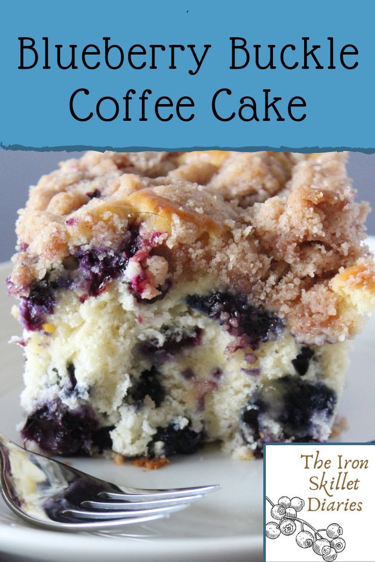 blueberry buckle coffee cake on a plate with a fork