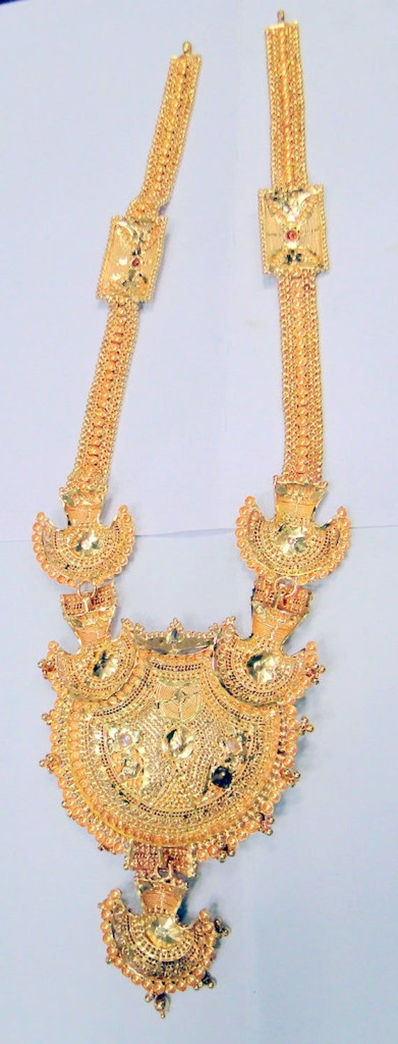 22K Solid Gold (Hallmarked) Choker Necklace from Rajasthan Northern India. Detail handmade piece in very good condition. Net-Gold weight -110 Grams, size of the pendant -10/8.5cm, length-24 inches. Gold Plated Jewelry With Intricate Design For Puja, 22k Yellow Gold Kundan Necklace As Gift, Traditional Yellow Gold Kundan Necklace Gift, Gold Temple Jewelry Chain Necklace Gift, Gold Temple Jewelry Style Chain Necklace, Heavy Pendant Necklace As A Gift, Festive Gold Necklace With Round Shape, Yellow Gold Plated Kundan Necklace, Traditional Gold Plated Temple Necklace As Gift