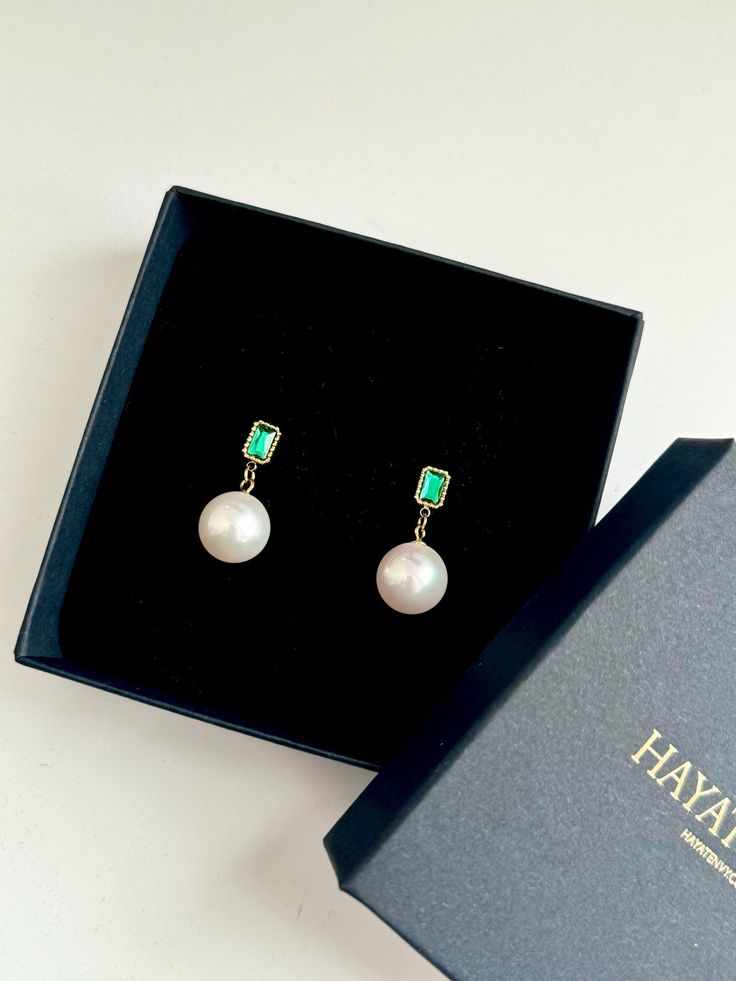 Freshwater pearl drop earrings Gold plated Stainless steel Emerald colour cubic zircon stone Formal Pear-shaped Emerald Earrings, Luxury Green Jewelry With Pearl Drop, Elegant Round Emerald Earrings, Elegant Green Jewelry With Pearl Charm, Elegant Green Pearl Earrings For May Birthstone, Elegant Party Earrings With Emerald, Elegant Emerald Earrings For Party, Elegant Emerald Earrings For Evening, Elegant Pear-shaped Emerald Earrings