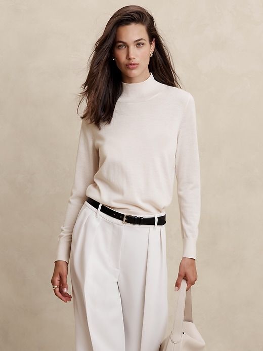 Merino Wool Turtleneck Sweater | Banana Republic Factory Beige Long Sleeve Polo Sweater For Work, Classic Fine Knit Polo Sweater For Spring, Merino Wool Turtleneck For Fall Workwear, Fall Merino Wool Turtleneck For Workwear, Cream Sweater For Workwear In Winter, Classic Long Sleeve Turtleneck For Work, Merino Wool Turtleneck With Ribbed Cuffs For Work, Beige Knit Polo Sweater For Workwear, Fine Knit Polo Sweater For Spring Workwear