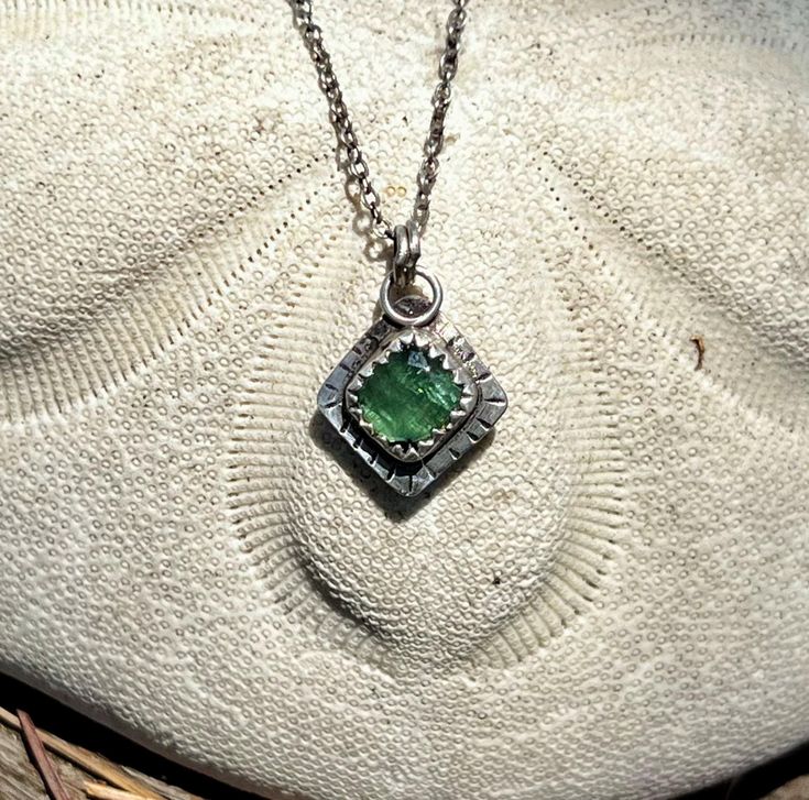 How cute is this pendant? This center stone is a gorgeous rose cut green tourmaline. It is set on the pointed end into a sterling silver sawtooth bezel with textured outer edge, then suspended from a sterling silver 18" link chain with a lobster claw clasp.  Both have an antique patina and are sealed, to help prevent tarnishing. it is about 1/2" across with a total drop of .75". This one of a kind pendant is the perfect size to be worn alone for a minimalist look or layered with your other treas Green Sterling Silver Hammered Jewelry, Green Hammered Sterling Silver Jewelry, Green Tourmaline, Rose Cut, Link Chain, Lobster Claw, Tourmaline, Necklace Etsy, Jewelry Necklace Pendant