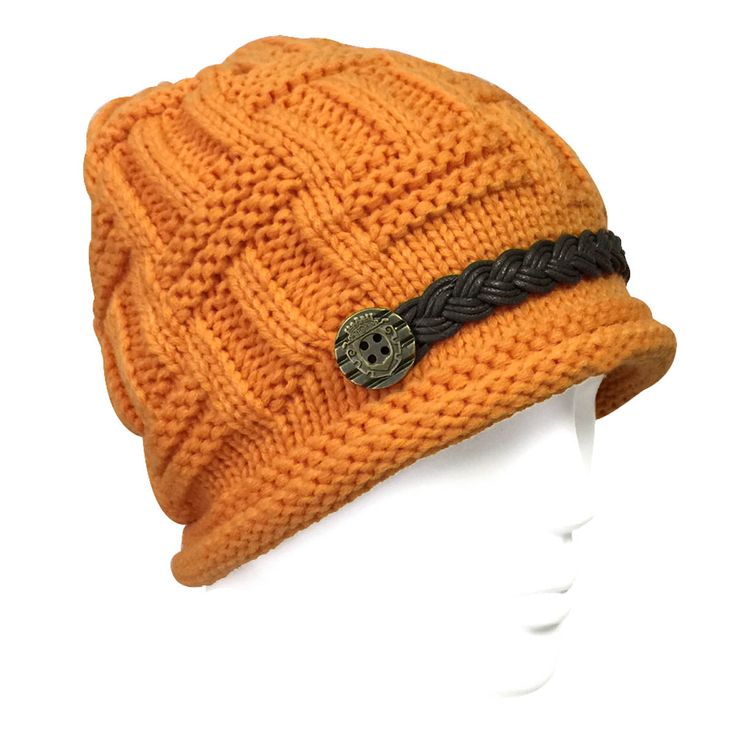 This knitted cap features a button strap across the front and can be slouched in the back. A comfy cap that can go over the ears, this hat will keep your head warm while looking stylish. The perfect winter accessory for skiing or outdoor play. Available in a variety of colors. Dimensions: 22 inch circumference, 8 inch height. Material: Acrylic. Adjustable Knitted Beanie For Outdoor, Outdoor Adjustable Knitted Beanie, Outdoor Soft Knit Crochet Hat, Warm Adjustable Beanie One Size, Adjustable Knitted Beanie, Adjustable Brimmed Beanie For Cold Weather, Brimmed Adjustable Warm Beanie, Warm Adjustable Brimmed Beanie, Casual Adjustable Bonnet For Cold Weather