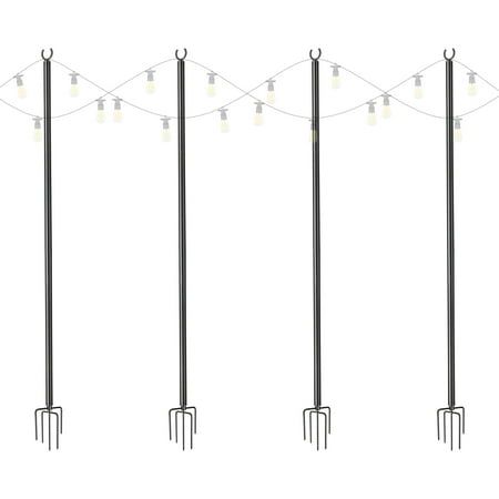 four different types of garden tools hanging on a line with lights in the shape of hearts