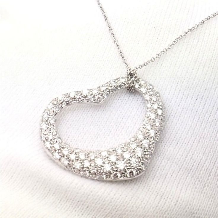 About This Piece: Retail Price: $26,000 plus tax. Metal: Platinum  Measurements:  Chain Length 17"  Pendant: 27mm x 25mm  Weight: 16.9 grams  Stones: Round brilliant cut diamonds VS1 clarity, G color Approx 3.00ctw  Hallmarks: Tiffany & Co PT950 Elsa Peretti Spain  . Formal Heart Cut Cubic Zirconia Necklace, Heart-shaped Cubic Zirconia Wedding Necklace, Heart-shaped Sparkling Stones Wedding Jewelry, Sparkling Stones Heart Pendant For Wedding, Sparkling Stone Heart Pendant For Wedding, Heart Cut Diamond White Necklace With 17 Jewels, Sparkling Heart Pendant For Wedding, Elegant Crystal Heart Necklace For Wedding, Heart-shaped Diamond White Crystal Jewelry