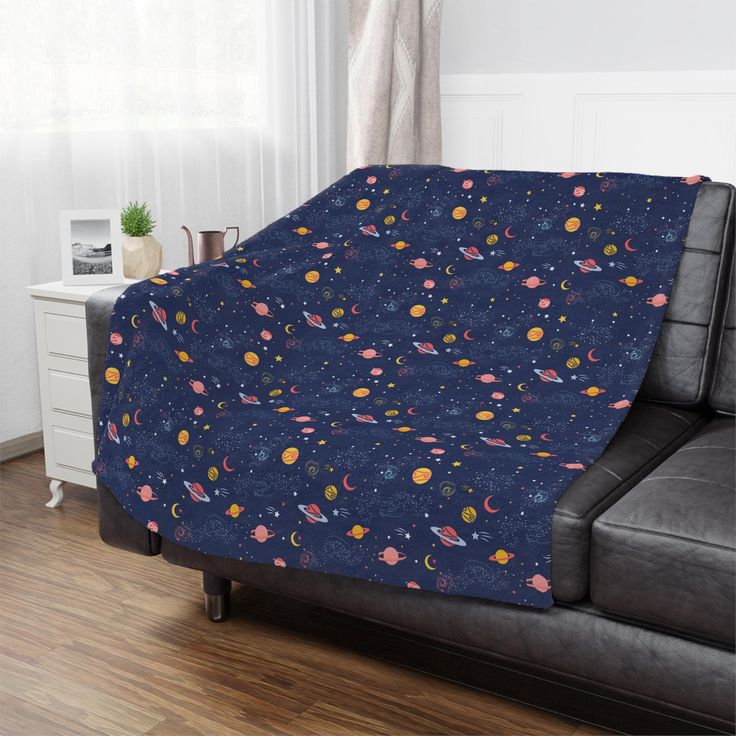 a couch with a blanket on top of it