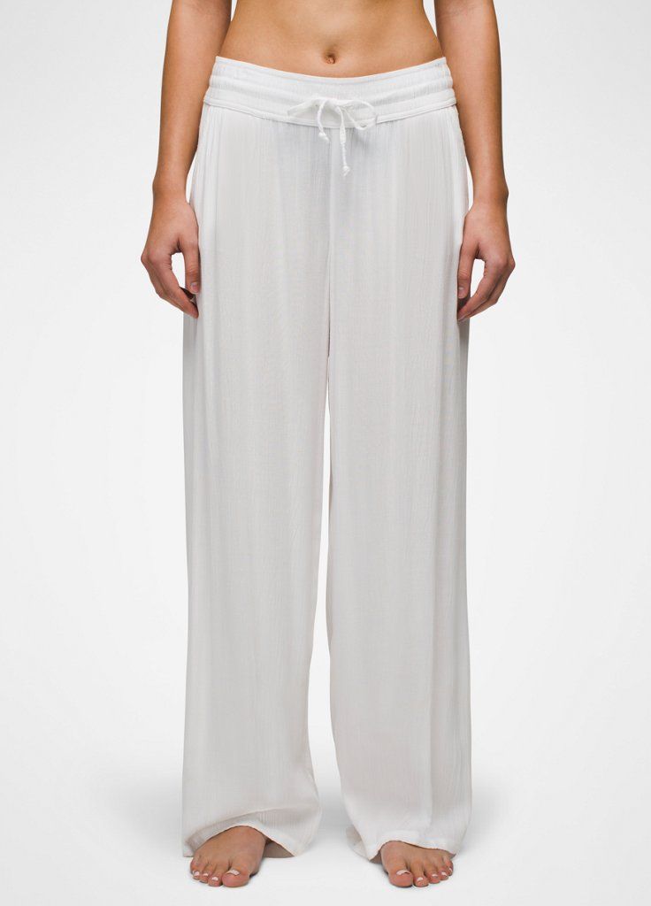 An Effortless Wide-leg Pant Ready To Become Your Go-to Cover-up For Beach Days. White Breezy Loungewear Bottoms, Breezy White Loungewear Bottoms, Summer Full Length Solid Wide Leg Pants, Summer Solid Color Wide Leg Pants, Solid Color Summer Wide Leg Full Length Pants, Summer Solid Color Full Length Wide Leg Pants, Solid Color Summer Wide Leg Pants, Breezy Loungewear Bottoms For Beach Season, Breezy Beach Season Loungewear Bottoms