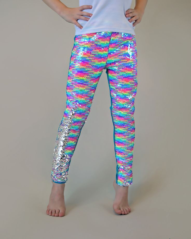 "Transform any occasion into a celebration with our dazzling sequined pants at Whitney Elizabeth! Crafted for ultimate comfort with a breathable cotton side, these pants flip the fun with a colorful, sequined reverse side. The perfect blend of style and comfort, ensuring your little one shines at every party with flippin' fun! * Front: 100% polyester | Back: 100% cotton * Hand wash for lasting sparkle and hang dry for endless flippin' fun! * If your little one is between sizes, we recommend sizi Dress Up Leggings, Jojo Siwa Shirts, Sequined Pants, Mermaid Pants, Magic Pants, Rainbow Pants, Shimmer Leggings, Unique Pants, Rainbow Leggings