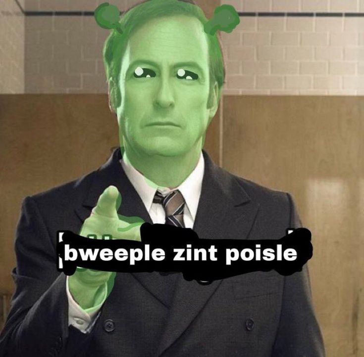 a man in a suit with green hair giving the thumbs up and saying i bweple znt poise