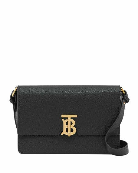 Classic in design, this rectangular crossbody bag is elevated with an iconic TB logo hardware. Snap-button flap closure Goldtone hardware One exterior slip pocket One interior snap-button pocket Six interior card slots Lined Leather Made in Italy SIZE Adjustable crossbody strap, 13.75"-17.75" drop 8.25"W x 5.75"H x 1.5"D ABOUT THE BRAND Founded in 1856 by 21-year-old Thomas Burberry, the brand set out with a mission to stylishly protect against British weather—and Burberry's iconic trench coat w Luxury Tan Pouch Shoulder Bag, Luxury Tan Crossbody Bags, Luxury Tan Crossbody Shoulder Bag, Luxury Satchel With Branded Hardware, Luxury Tan Flap Bag For Daily Use, Classic Tan Bags With Dust Bag, Classic Tan Bags With Dust Bag Included, Classic Crossbody Bags For Everyday Luxury, Luxury Tan Bags With Branded Hardware