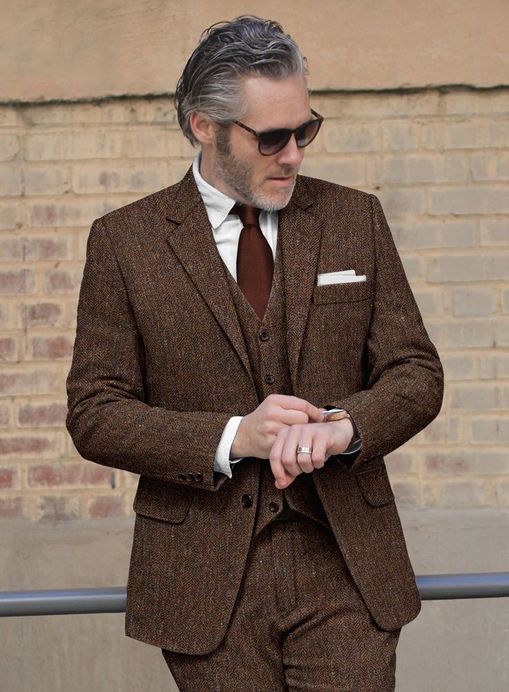 Take the easy route to looking well-dressed with our Haberdasher Autumn Rust Tweed Jacket which is a must-have wardrobe staple. Crafted from a wool blend, the jacket features a herringbone pattern that brings a breath of fresh air, while the tweed fabric makes it a perfect choice for frosty weather.   Look Includes  Haberdasher Autumn Rust Tweed Fabric  Two Button Jacket Style  Notch Lapel   Faux Horn Brown  Buttons  Single Vent  Three Cuff Buttons   You can change the look by changing the options listed.  Lining: Viscose, Dry Clean. Tweed Suit, A Breath Of Fresh Air, Tweed Suits, Button Jacket, Tweed Fabric, Breath Of Fresh Air, Wool Suit, Mens Oxfords, Herringbone Pattern