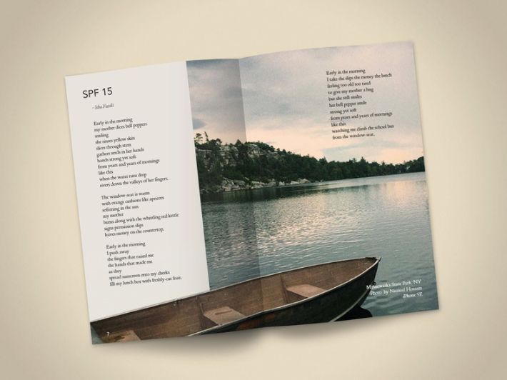 an open brochure with a boat on the water and trees in the background