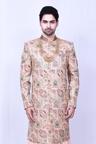 Peach longline sherwani with floral and geometric pattern multi colored embroidery. Comes with peach anarkali kurta and churidar.
Components: 3
Pattern: Embroidered
Type Of Work: Floral, Geometric
Neckline: Sherwani: Mandarin, Anarkali: Notched
Sleeve Type: Full
Fabric: Banglori Silk
Color: Peach
Other Details: 
Embellished sherwani buttons
Side pocketed pant
Note: Neckpiece worn by the model is not for sale
Occasion: Groom,Wedding - Aza Fashions Bollywood Multicolor Embroidered Sherwani For Diwali, Traditional Fitted Sherwani With Multicolor Embroidery, Bollywood Style Embroidered Sherwani For Designer Wear, Fitted Multicolor Embroidered Sherwani With Traditional Drape, Bollywood Sherwani With Multicolor Embroidery And Zari Work, Bollywood Style Sherwani With Multicolor Embroidery For Eid, Bollywood Style Multicolor Sherwani With Zari Work, Eid Reception Kurta With Multicolor Embroidery, Eid Sherwani With Multicolor Embroidery And Traditional Drape