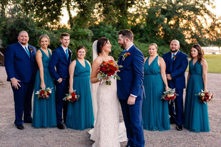 a bride and groom with their bridal party