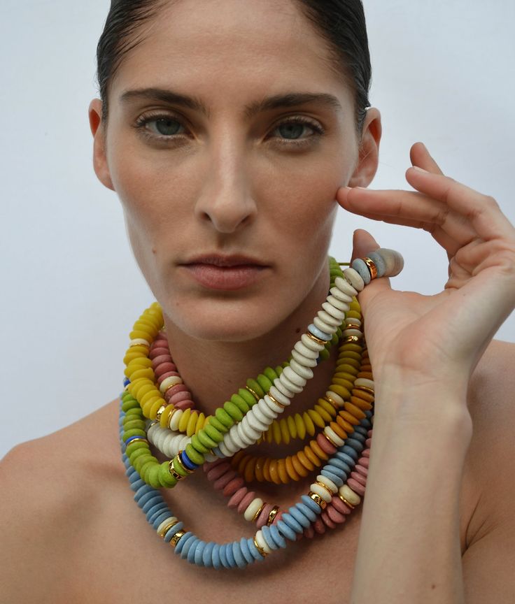 Say hello to the Laguna Necklace, our best-selling, consciously crafted statement piece strung with recycled glass beads. These unique, ethically-sourced Ashanti beads come from Ghana, Africa and are created using the same traditional methods employed by craftspeople for over 1000 years. For every purchase of the Laguna Necklace in Sky Blue, we're donating 15% to the Environmental Defense Fund to support the preservation of our environment and natural resources. Recycled glass beads, gold-plated Modeling Jewelry, Recycled Glass Bead Necklace, Modern Beaded Jewelry, Necklace Ads, African Glass Bead Necklace, Necklace Clay Beads, African Glass Beads, Wrap Necklace, Statement Necklace 2024