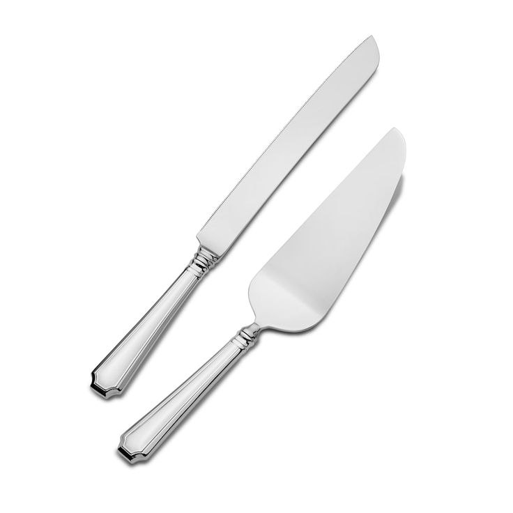 two knives and a fork on a white background