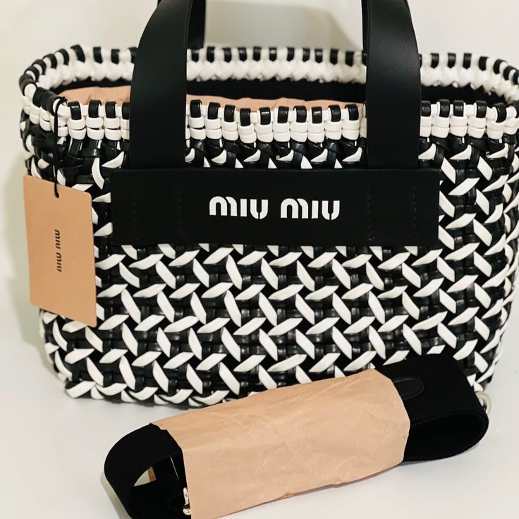 Miu Miu Bag - Shoulder Bag/Handbag - Color: Black And White - Material: Leather - Condition: Excellent Condition/ Never Worn - Size: W10.6*H7.1d5.9 - Accessories: Dust Bag Black Top Handle Miu Miu Shoulder Bag, Black Miu Miu Shoulder Bag With Top Handle, Black Miu Miu Top Handle Shoulder Bag, Miu Miu Black Shoulder Bag For Everyday Use, Luxury Black Miu Miu Shoulder Bag, Chic Black Miu Miu Shoulder Bag, Chic Miu Miu Shoulder Bag With Detachable Handle, Chic Miu Miu Shoulder Bag For Everyday Use, Chic Miu Miu Shoulder Bag For Everyday