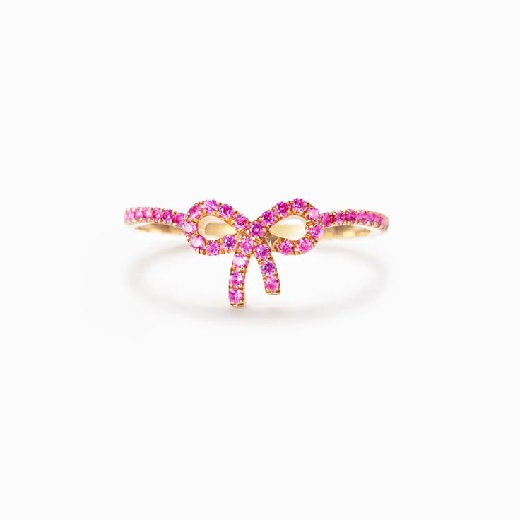 PRICES MAY VARY. Pink Pavé Bow Ring --- Give the gift of a sparkly surprise with this sweet pink pavé bow ring. Micro-Inlaid Zircon Rings, The sparkle that shines on your body inspires you to seek beauty in every moment of your life. Good Quality --- Bow Ring is made of copper and AAA cubic zirconia. It is not easy to be allergic, and it can be worn with peace of mind for sensitive skin. Suitable For Any Occasion --- Pink Pavé Bow Ring unique design can highlight your appearance, and grasp every