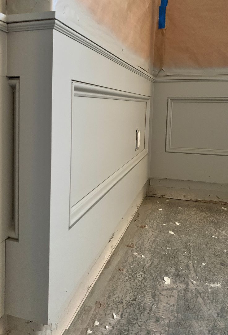 the corner of a room that has been painted white