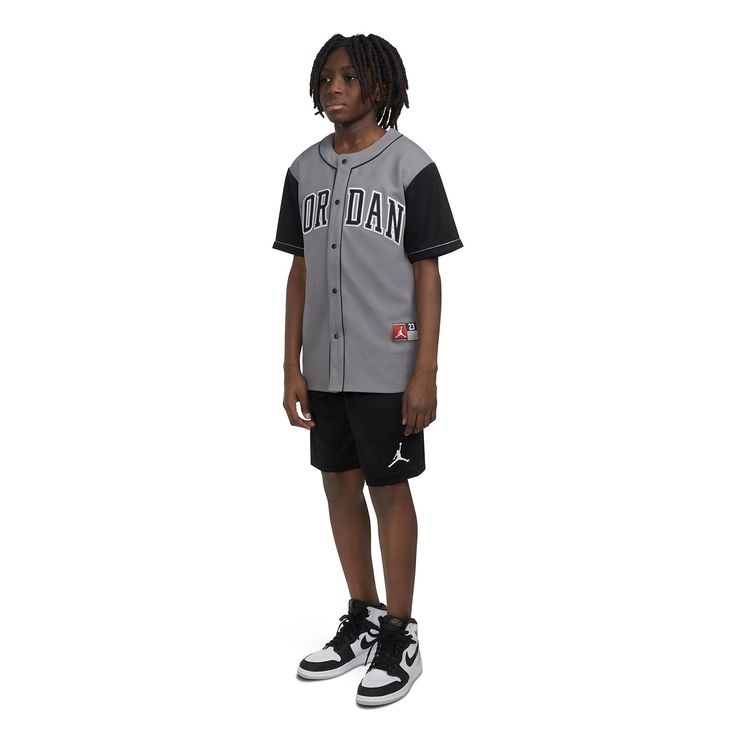 Baseball vibes with a basketball legacy. Showcase your love for both games in the Jordan HBR Baseball Jersey. Made with lightweight fabric, this jersey buttons down the front. It features heat-sealed Jordan and 23 logos on the front and back. Pair it with your AJ1s for a look worth posting on your socials. Button down jersey. Heat-sealed appliques logos at the front and back. Imported. Varsity Basketball Jersey Tops, Black Casual Basketball Jersey, Throwback Team-colored Cotton Baseball Jersey, College Throwback Baseball Jersey With Team Logo, Throwback College Jersey With Team Logo, Casual Black Baseball Jersey With Team Logo, College Throwback Jersey With Team Logo, Varsity Basketball Tops With Moisture-wicking, Varsity Basketball Top With Moisture-wicking