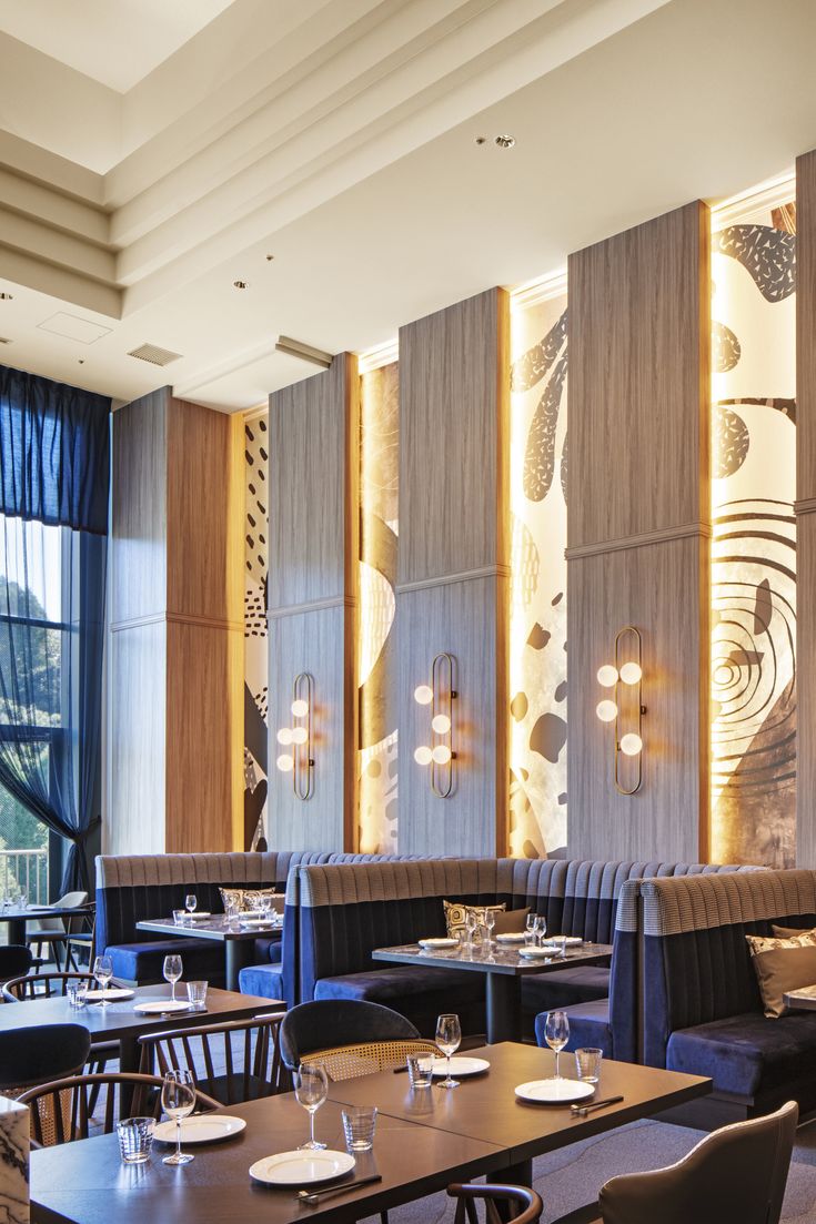 an empty restaurant with tables and chairs