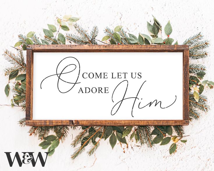 a sign that says come let us adore him