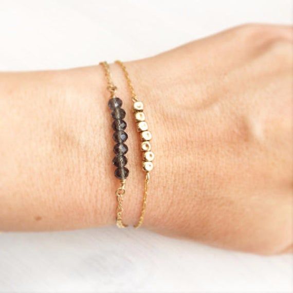 "A minimalist gold filled bracelet. A simple style nugget bracelet that you must have in your accessory box! This lovely bracelet is perfect for daily use. You can wear it as a single minimalist bracelet, or layered with other bracelet for that Boho-chic look. This bracelet is made from high quality 14K \"Gold Filled\" - unlike \"gold plating\" the gold in gold filled jewelry is mechanically bonded to the base metal, and it WILL NOT WEAR OFF OR TURN BLACK. Fantastic gift for anyone you love. Fea Minimalist Adjustable 14k Gold Filled Beaded Bracelets, Adjustable Gold Beaded Bracelets As Best Friend Gift, Adjustable Gold Beaded Bracelets For Best Friend, Minimalist 14k Gold Bracelets With Gold Beads, Simple Adjustable 14k Gold Filled Bracelets, Adjustable Simple 14k Gold Filled Bracelets, Adjustable Minimalist 14k Gold Filled Bracelet, Minimalist 14k Gold-filled Beaded Bracelets, Minimalist 14k Gold Filled Bracelets As Gift