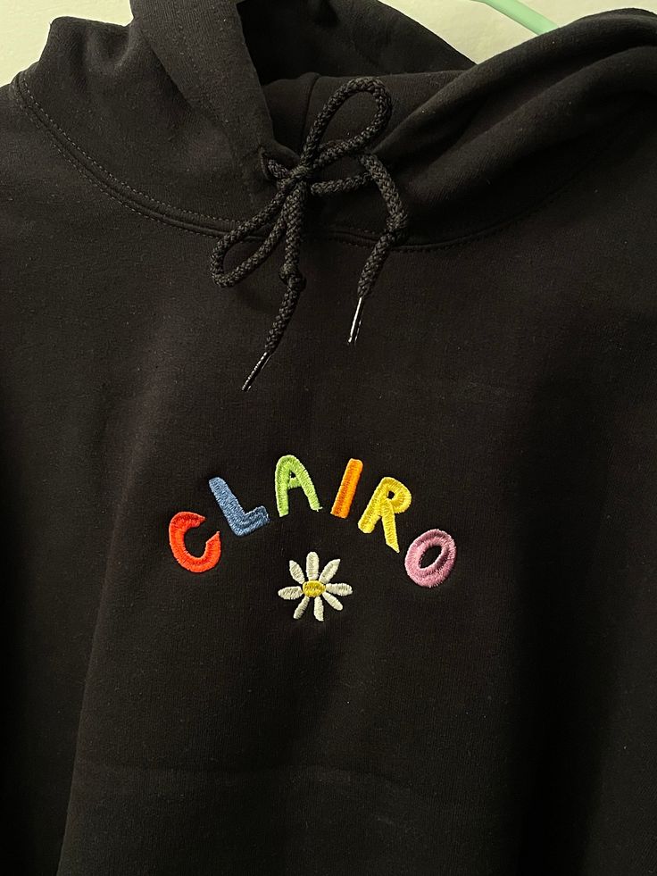 clairo hoodie - designed by me - embroidered - handmade to order - super soft and comfy - pre-shrunk 50/50 cotton/polyester please dm if you have any questions! 👀 Black Cotton Hoodie With Embroidered Logo, Trendy Embroidered Hooded Hoodie, Cute Embroidered Hoodie For Streetwear, Trendy Cotton Hoodie With Embroidered Graphics, Black Hoodie With Embroidered Logo, Black Embroidered Hooded Hoodie, Cute Black Hooded Sweatshirt, Cute Hoodie With Embroidered Graphics For Streetwear, Sporty Black Embroidered Sweatshirt