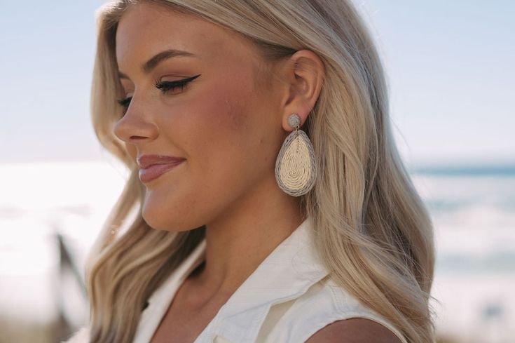 Elevate your summer style with our Straw Tear Dangle Earrings! These unique earrings feature a chic straw color block detail, adding a touch of natural elegance to any outfit. The tan base with a light grey outline adds a subtle pop of contrast, making these earrings the perfect statement piece. Elegant Beige Earrings For Spring, Chic Drop Earrings For Beach, Chic Beach Earrings, Natural Color Drop Earrings For Summer, Elegant Earrings For Vacation In Spring, Elegant Beige Earrings For Vacation, Natural Color Earrings For Vacation In Spring, Beige Jewelry For Spring Vacation, Casual Everyday Earrings For Summer