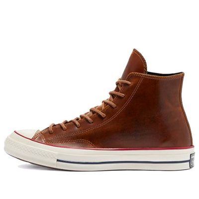 If you're looking for a classic sneaker with a premium twist, look no further than the Converse Chuck 70 High Color Leather 'Clove Brown'. This high-top sneaker features a full-grain leather upper with tonal stitching and waxed laces for a sophisticated look. The debossed All Star patch on the medial ankle adds a touch of retro style, while the glossy off-white rubber midsole provides cushioned comfort. Underfoot, the standard diamond-pattern rubber outsole delivers grippy traction. (SNKR/Unisex) Brown Retro Custom Sneakers For Streetwear, Classic Leather High-top Sneakers With Boost Midsole, Classic High-top Sneakers For Streetwear, Retro High-top Sneakers With Boost Midsole, Retro High-top Skate Shoes With Boost Midsole, Vintage Lace-up Sneakers With Rubber Toe Cap, Classic High-top Sneakers With Rubber Sole And Round Toe, Vintage Converse Sneakers With Rubber Sole, Classic Leather High-top Sneakers With Speckled Midsole