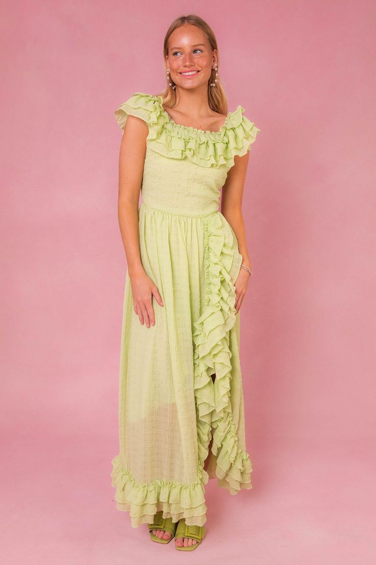 Green textured print. Scoop tiered ruffle neckline. Short tiered flutter sleeves (extension of neckline). Maxi wrap skirt with tiered ruffle hem. Hidden back zipper. Fully lined. Fabric is non-stretch. Stretch style with elastic waist. Fabric Shell: 100%, Polyester. Lining is 100% Polyester. Hand wash cold; lay flat to dry. Available in sizes XXS, XS, S, M, L, XL, 1X, 2X, 3X, 4X, + 5X!! plus size fashion, green dress, ruffles, summer outfit, summer style, spring outfit, maxi dress, date night Flowy Breezy Maxi Dress With Ruffles, Floor-length Ruffle Dress With Ruffle Hem For Summer, Summer Floor-length Ruffle Dress With Ruffle Hem, Ruffle Maxi Dress For Garden Party, Summer Maxi Dress With Ruffles For Garden Party, Breezy Maxi Dress With Ruffles, Vacation Maxi Dress With Ruffled Skirt And Straps, Maxi Dress With Ruffled Skirt And Straps For Vacation, Spring Maxi Dress With Ruffled Skirt