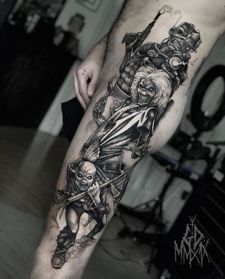 a man with a tattoo on his leg