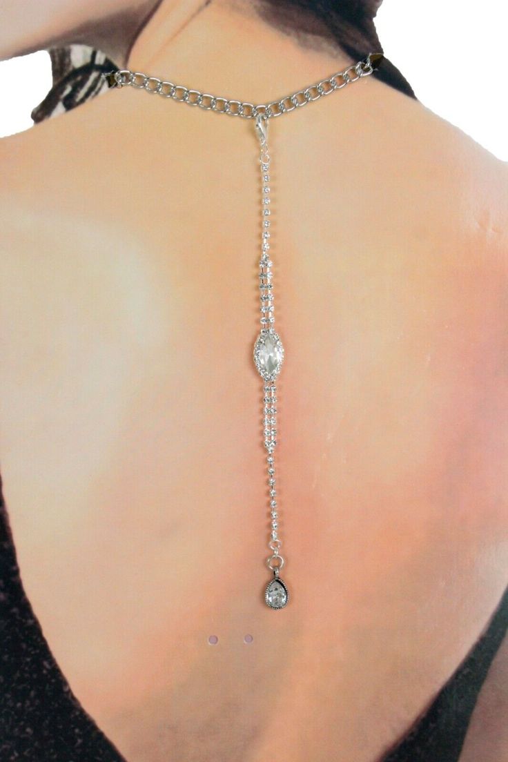 Sexy Women Fashion Back Necklace Hot Jewelry PENDANT - bling rhinestones shiny pendant Trendy fashion chain open back long elegant necklace pendant  You are buying the pendant that is connected to your own necklace - it will be connected to the back of your necklace - on your back. Sexy collection Party Wedding Special Design Made By Us In The USA Condition: Brand new Color: Silver metal chain and rhinestones Drop:  About 7 4/8" Bling Rhinestones, Bling Necklace, Back Necklace, Hot Jewelry, Open Back Dress, Elegant Necklace, Open Back Dresses, Elegant Necklaces, Jewelry Pendant