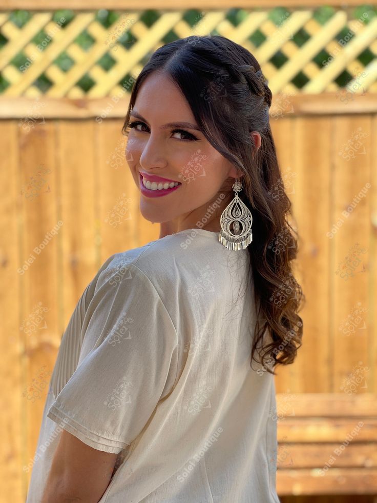 This Beautiful Hand embroidered blouse has a unique and Mexican inspired Floral design. The blouse has a beautiful traditional look to it and is made with fresh Mexican linen. The Jewelry modeled may be purchased here: Filigree Earrings: https://www.etsy.com/es/listing/872372628/filigrana-clasica-de-gota-arete-mexicano?ref=listings_manager_grid Bohemian Blouse With Woven Motifs For Festivals, Bohemian Top With Resham Embroidery For Wedding, Bohemian Blouse With Woven Motifs, Bohemian Resham Embroidery Top For Festival, Bohemian Resham Embroidered Top For Festival, Bohemian Tops For Weddings And Festivals, Traditional Wedding Top With Embroidered Neckline, Bohemian Embroidered Top For Wedding, Bohemian Tops With Woven Motifs For Festive Occasions