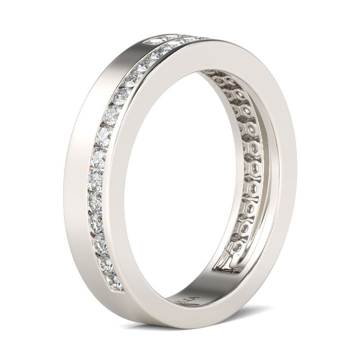 Celebrate your everlasting love story with this elegant band. Stunning as a wedding or anniversary band, it showcases a bypassing row of sparkling round stones set on a high polished shank. With grace and shimmer, this sparkling band is a classic style that complements her sophisticated taste. Carat Weight: 0.912 ctStone Size: 1.5 mmStone Type: Jeulia® StoneNumber of Stones: 32 Stone Color: Diamond WhiteStone Shape: RoundWeight: 4.57 gWidth: 3.42 mmThickness: 1.77 mmMaterial: 925 SilverPlating C Classic Cubic Zirconia Bands With Brilliant Cut, Formal Baguette Cut Eternity Band With Channel Set, Formal Baguette Cut Channel Set Eternity Band, Diamond White Round Cut Band For Anniversary, Formal Half Eternity Platinum Band, Elegant Promise Ring With Channel Set Bands, Elegant Channel Set Promise Ring Bands, Diamond Ring With Side Stones For Anniversary, Half Eternity Diamond Band For Anniversary