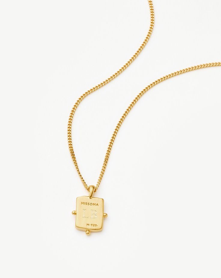 Lucy Williams Engravable Beaded Square Coin Pendant Necklace | 18k Gold Vermeil. A Classic, Reimagined. Set on a Delicate Mini Curb Chain, this Versatile Necklace Features an Engravable Square Beaded Coin Inspired by Ancient Rome. Lend It More Impact by Styling with a Long Pendant Necklace. Please Note: Engraving Items May Take 2 Working Days to Process. Metal: 18K Recycled Gold Plated Vermeil on Recycled Sterling Silver Pendant Dimensions: 14. 3mm X 8. 8mm Length: 450mm with Continuous Extensio Refined Hallmarked Jewelry For Gift, Refined Hallmarked Jewelry Gift, Luxury Engraved Jewelry With Square Pendant, Luxury Engraved Square Pendant Jewelry, Yellow Gold Jewelry With Box Chain And Rectangular Pendant, Classic Gold Jewelry With Rectangular Pendant, Refined Engraved Yellow Gold Jewelry, Refined Gold Jewelry For Gift, Timeless Rectangular Yellow Gold Jewelry