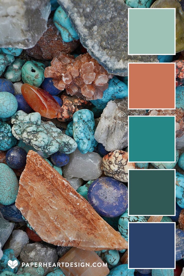 rocks and stones with different colors in the middle, including blue, green, orange, and