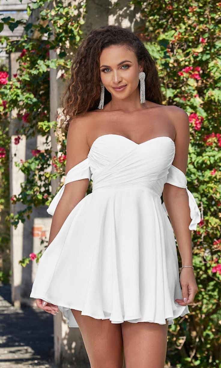 Short a-line off the shoulder party dress with sweetheart neckline. Strapless Bridesmaid Mini Dress For Summer, Flirty Strapless Mini Dress For Bridesmaids, Flirty Mini Strapless Dress For Bridesmaid, Off-shoulder Mini Dress For Prom Season, Off-shoulder Mini Dress For Prom And Party Season, Fitted Off-shoulder Mini Dress For Homecoming, Off-shoulder Mini Dress For Prom, Chic Off-shoulder Mini Dress For Homecoming, White Strapless Off Shoulder Flirty Dress