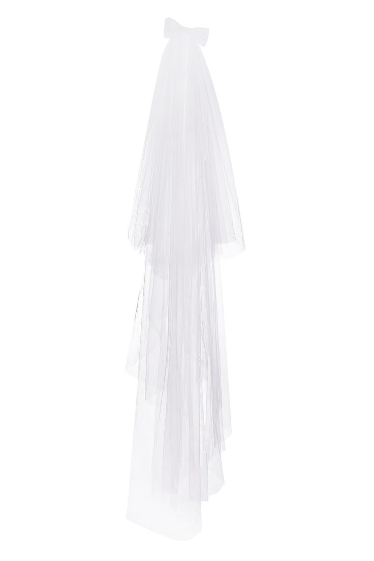 a white veil hanging from the ceiling