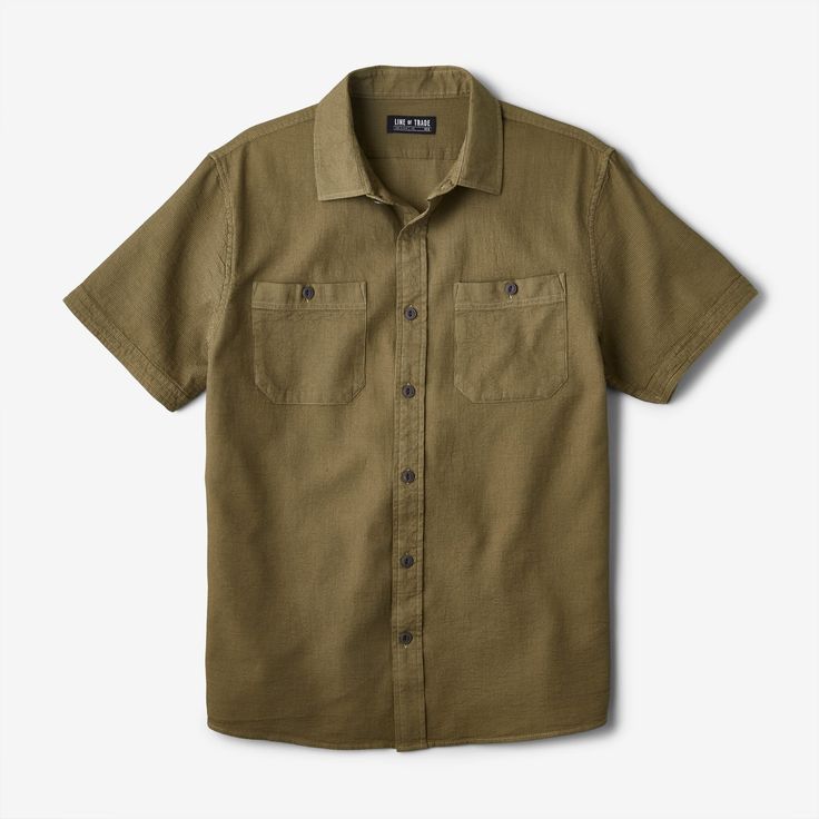 Line of Trade has stitched up a super comfy, modern take on the familiar two-pocket work shirt. A lightweight standout in any summer wardrobe, its built with a unique two-tone, pure cotton waffle weave for an upgraded texture. Its finished with heritage-inspired touches like mitered button pockets, folded and stitched sleeve cuffs, and a curved hem that makes for a great look, tucked or untucked as needed. And when youve called it a night, its got a back hanger loop to toss up on a hook, ready f Casual Button-up Camp Shirt With Pockets, Unstructured Cotton Shirt With Flap Pockets, Outdoor Cotton Tops With Flap Pockets, Cotton Tops With Flap Pockets For Outdoor, Outdoor Button-up Tops With Patch Pockets, Button-up Tops With Patch Pockets For Outdoor, Collared Tops With Patch Pockets For Outdoor, Utility Cotton Shirt With Side Pockets, Outdoor Cotton Shirt With Patch Pockets