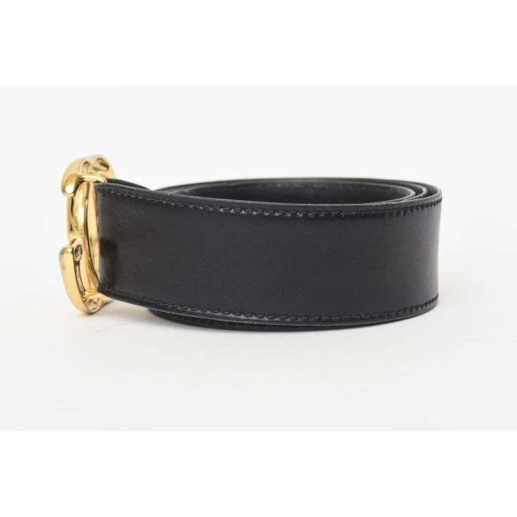 This 1980's Gucci black leather logo wide vintage belt is Italian and has the large gold plated GG's. It says 100/40 on the inside back. The GG's measure 2.5" W x 2.5" H as they are intertwined. The black belt strap is 44" L or wide x 1.85" H or deep. With the GG's logo included the entire belt width is 46.25" W or long. Says Made in Italy by Gucci. There are 3 original belt holes. Black Leather Belt Buckles With Gold-tone Hardware, Luxury Black Belt Buckles With Gold-tone Hardware, Black Belt Buckles With Gold-tone Hardware For Business, Luxury Black Belt Buckle With Gold-tone Logo Plaque, Formal Black Belt Buckles With Gold-tone Logo, Elegant Black Belt Buckle With Gold-tone Logo, Gucci Designer Belt Buckles For Business, Designer Formal Belt Buckles With Gold-tone Hardware, Designer Belt Buckles With Gold-tone Hardware For Formal Wear