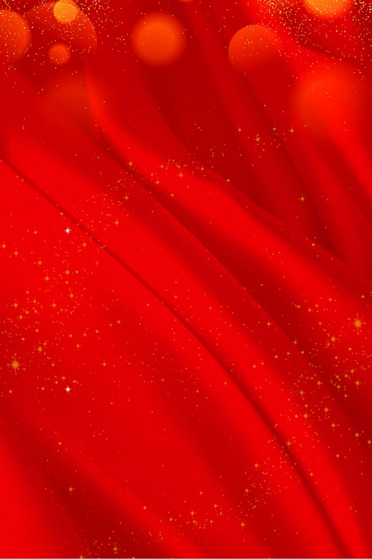 an abstract red background with gold sparkles