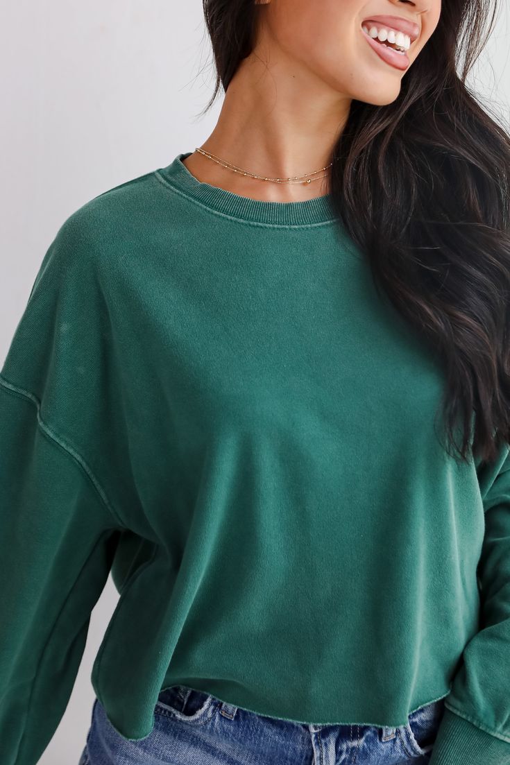 Get ready for a cozy forecast with a 100% chance of looking cute in the Chill Out Cropped Pullover! This stylish pullover features a soft, plush terry cloth lining that provides ultimate comfort and warmth. The cropped design adds a trendy twist, making it perfect for pairing with high-waisted jeans or skirts. With a relaxed fit and long sleeves, this pullover is ideal for lounging at home or running errands in style. The lightweight fabric makes it easy to layer, while the versatile color optio Soft-washed Sweatshirt For Everyday, Soft-washed Everyday Sweatshirt, Oversized Super Soft Tops For Fall, Comfy Solid Color Super Soft Sweatshirt, Comfy Solid-colored Super Soft Sweatshirt, Comfy Super Soft Solid Sweatshirt, Cozy Super Soft Solid Sweatshirt, Everyday Solid Sweatshirt With Soft Texture, Cozy Solid Color Super Soft Sweatshirt