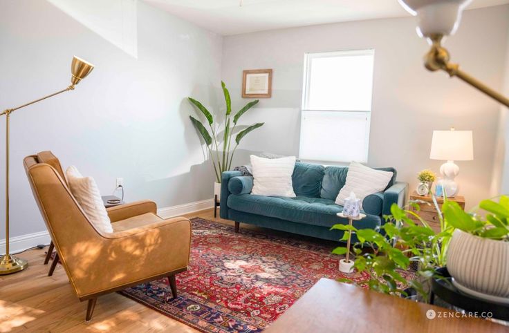 a living room filled with furniture and a rug